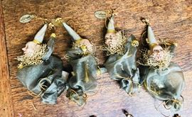 Katherine's Collection. Small jester bags with a tiny instrument inside. Retired. $14 each.