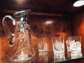 Etched crystal pitcher with tumblers.