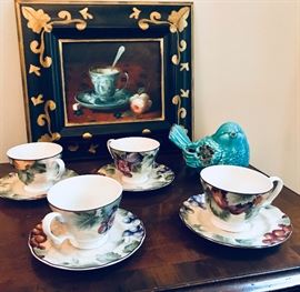 Napa Valley by Noble Excellence coffee cups & saucers.  Description: Tan Rim, Large Grapes, Apple, Pear &Plum. $12.50 each. Framed painting @ $85. Turquoise bird @ $20