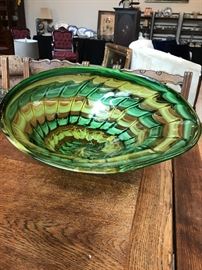 Glass bowl to hang on wall. 20" x 18". $100. Greens and golds/yellows.
