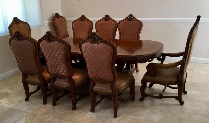 Huge, gorgeous wood dining room table and chairs