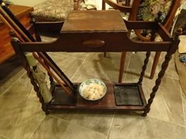 antique umbrella stand with lift up storage