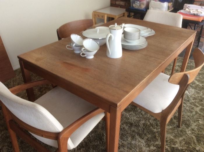 Teak dining table and four chairs