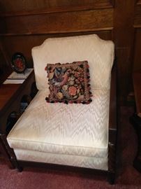 The arm chair is lower than most chairs.