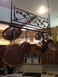 Hanging copper cookware adds a special touch to any kitchen.