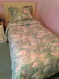 One of two matching twin beds