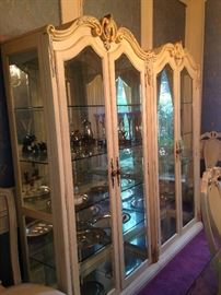 Two spacious (side-by-side) china display cabinets