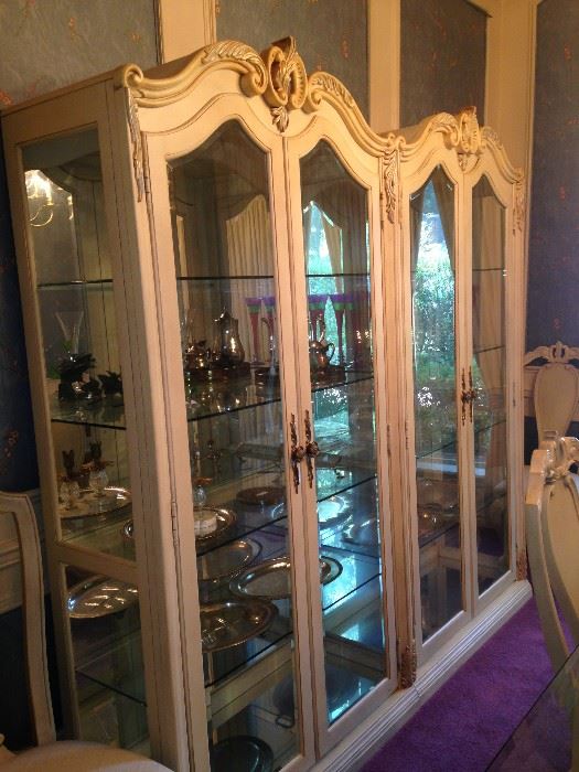 Two spacious (side-by-side) china display cabinets