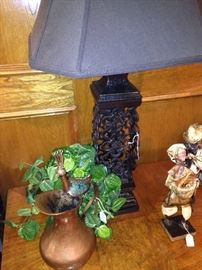 Large black lamp; copper pitcher