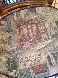 Each chair has a French cafe fabric cushion