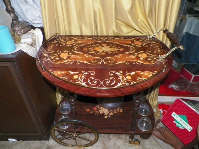 Bar cart with glasses and decanter