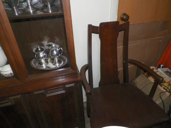 1 of 2 arm chairs along with 4 side chairs included in the dining room set