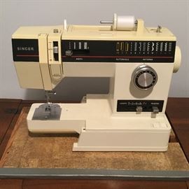 $60 Singer sewing machine with cabinet