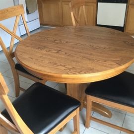 $175 Round table with four chairs measures 42" with 18" leaf