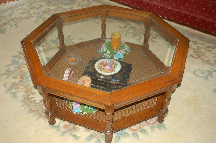 Lovely glass topped/wicker bottom coffee table