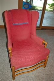 Straight back cushioned chair