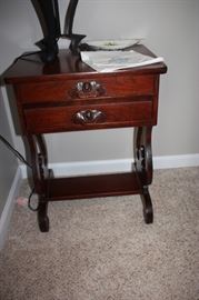 Walnut end table.  One of two