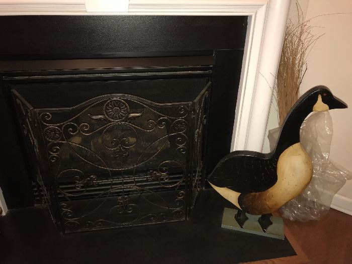 Wrought iron fire place screen; Hand painted wooden goose