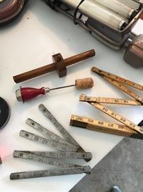 Vintage measuring tools and ice pick