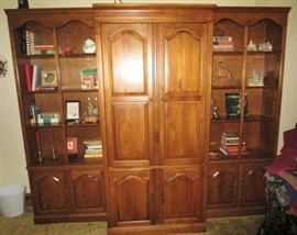 3 piece wall unit w/ center entertainment center, sold separately
