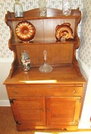 Ethan Allen kitchen cupboard, copper molds, crystal decanter, vintage cookie cutters