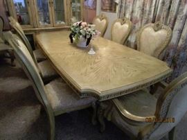 8' Table with 8 chairs. Immaculate condition.