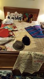Vintage hats, handbags, saddle shoes, table linens, and textiles