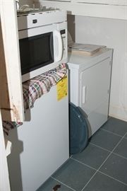 Washer dryer and built in microwave