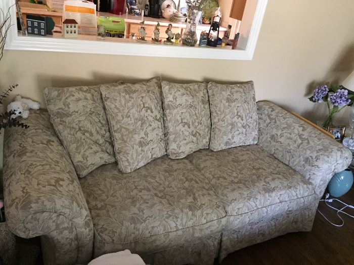 Overstuffed "shabby chic" sofa with matching chair and ottoman. Purchased from Marshall Field's in 1997.