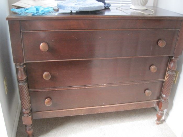 chest of drawers has mirror