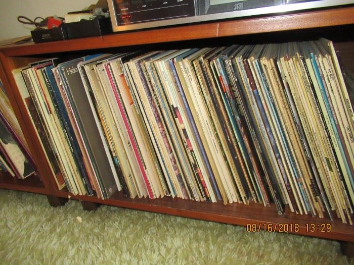 Record cabinetry and over 200 vinyl, wide variety of titles and selections