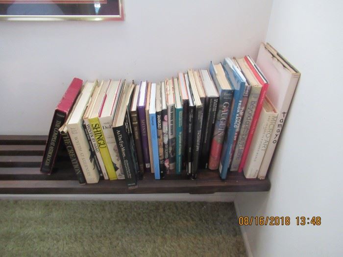 Art Books and a great slatted shelf, shelf has legs on one side and then would attach to the wall with a support