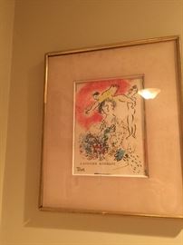 This is L'Atelier Mourlet by Marc Chagall - 1965 has note taped to the back color lithograph signed print.  This piece is also priced to sell.