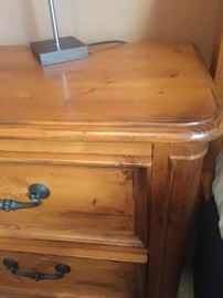 Nightstand that matches the two full size beds, there are two.