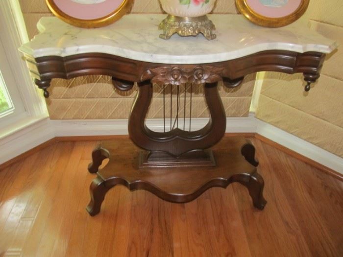 Lyre based marble top table