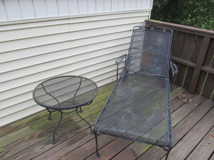 wrought iron chaise and table
