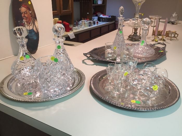 Crystal decanters and silver-plated platters/trays