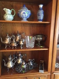 Silverplated tea/coffee sets and service pieces and Waterford ice bucket