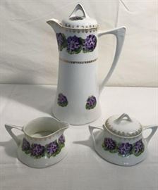 Porcelain Cocoa Pot, Creamer and Covered Sugar  http://www.ctonlineauctions.com/detail.asp?id=747852