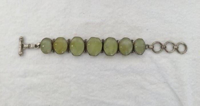 Sterling Silver Bracelet with Green Gemstone      http://www.ctonlineauctions.com/detail.asp?id=748074             