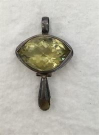 Sterling Silver Pendant w/ Light Green Gemstones        http://www.ctonlineauctions.com/detail.asp?id=748075