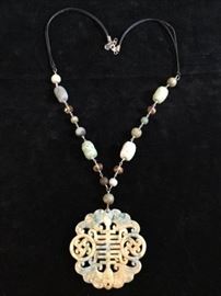 Carved Jade and Gem Necklace       http://www.ctonlineauctions.com/detail.asp?id=748084