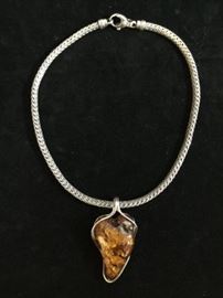  Sterling Silver and Amber Necklace   http://www.ctonlineauctions.com/detail.asp?id=748089