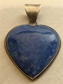 Sterling Silver Pendant w/ Blue Heart Stone    http://www.ctonlineauctions.com/detail.asp?id=748108
