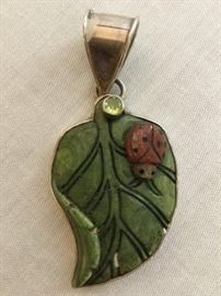  Sterling Silver Pendant with Green Jade    http://www.ctonlineauctions.com/detail.asp?id=748114