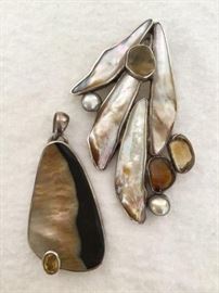  Two Marta Howell Sterling Silver Pendants     http://www.ctonlineauctions.com/detail.asp?id=748137