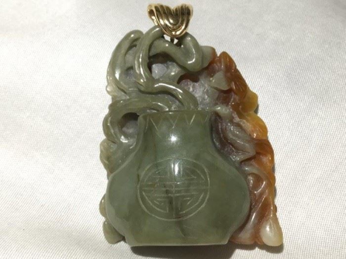 Carved Jade Pendant with 14kt Gold Loop http://www.ctonlineauctions.com/detail.asp?id=748148