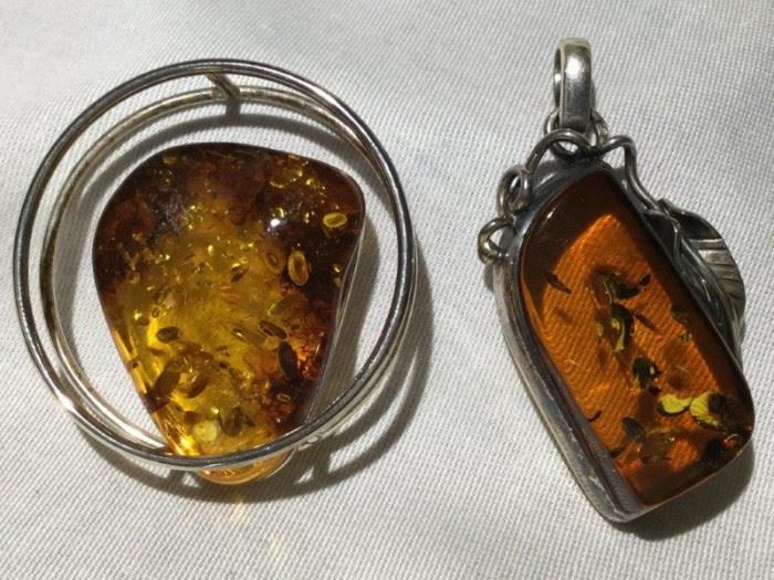  Two Amber Pendants Set in Sterling Silver    http://www.ctonlineauctions.com/detail.asp?id=748151