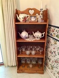 Country stand with teapots and glassware