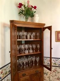 China corner cupboard with nice glassware